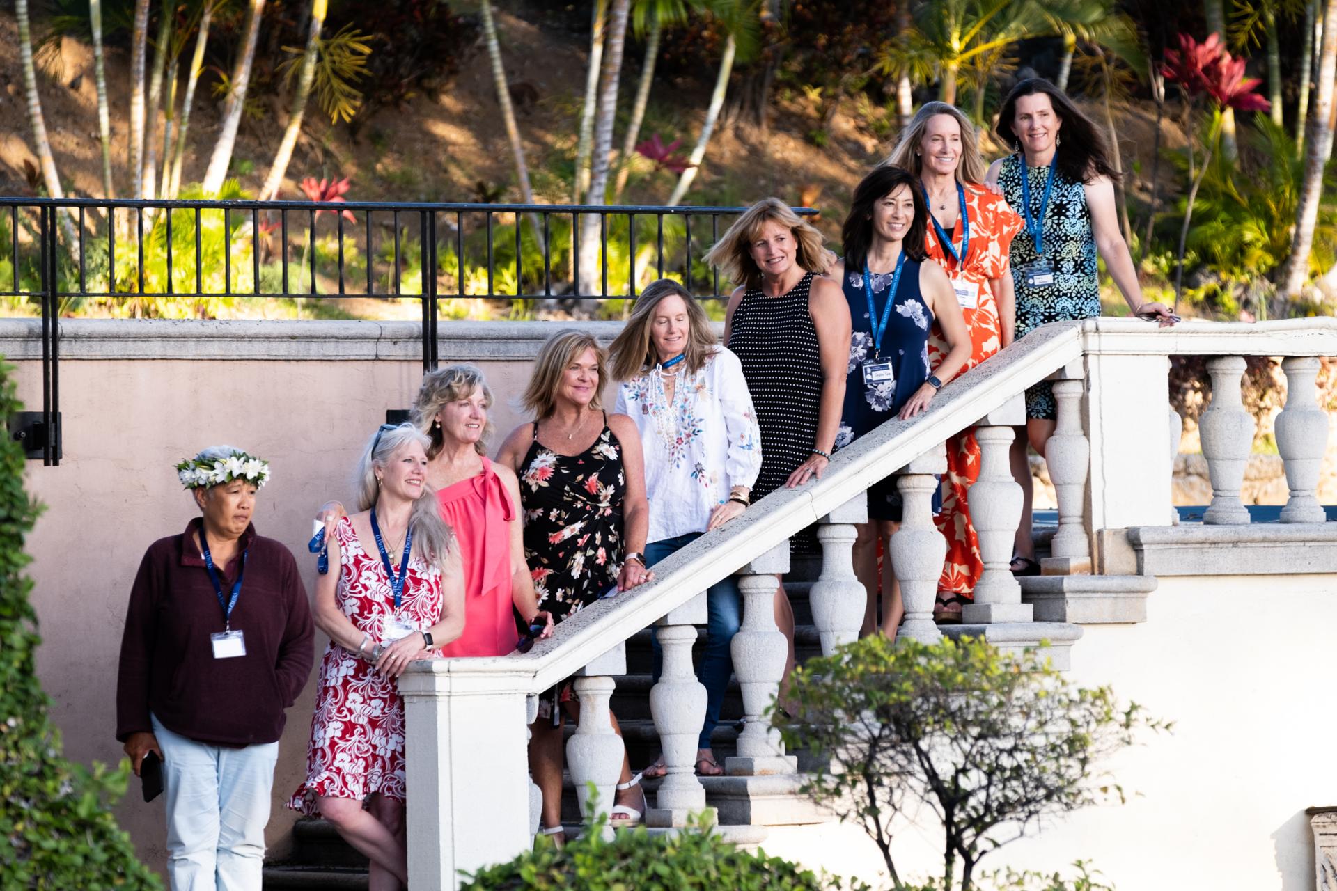 La Pietra alumnae pose on the staircase to the Great Lawn.